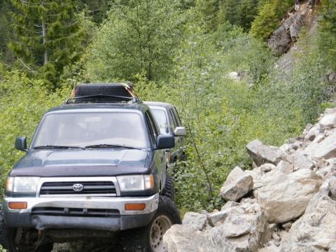 4Runners crossing rock slide