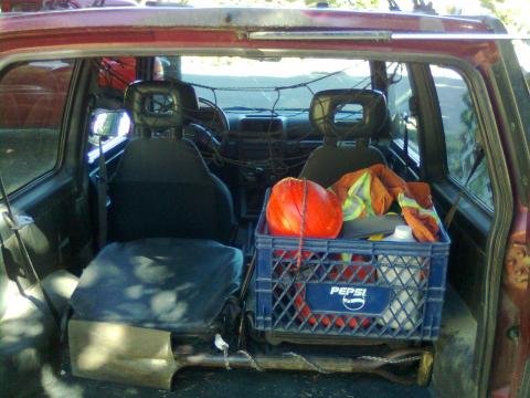 not alot of space. i keep a quad winch. 3000lb. truck weighs 2400lbs. a gallon of gas. a shovel. axe. first aid box and a handful of tools. 