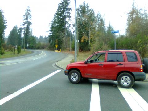 closest entrance from chase river. the last 8ft of curb is the ticket in. right at the one lane end sign is. after flagstone.