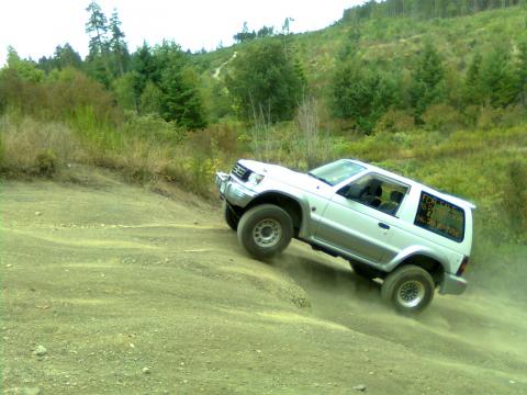 tony gettin air on the 13th st hill. nanaimo ridge.  stock pajero