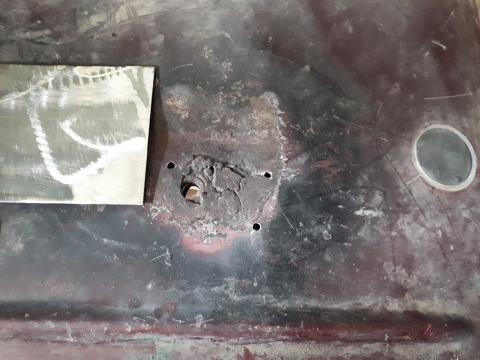 hole in floor under seat mount, 