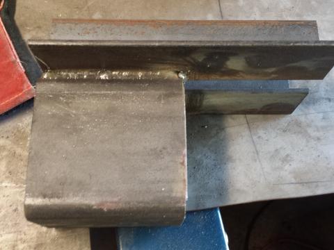 Shackle relocation bracket